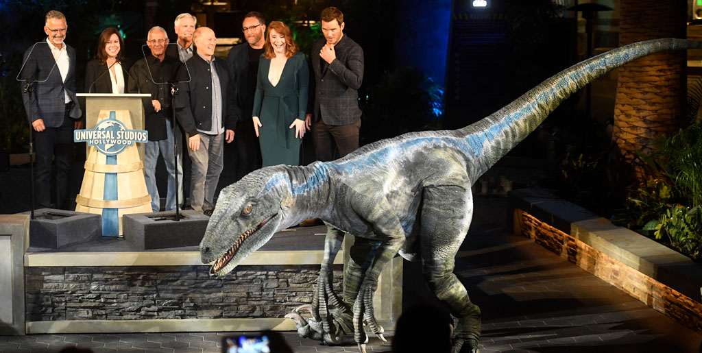 Chris Pratt tames a dinosaur and more moments from the 'Jurassic World' ride opening