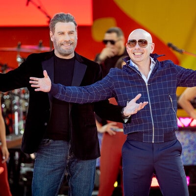 John Travolta hits the dance floor in Pitbull's 3 to Tango music video