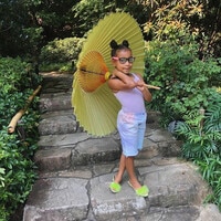 North West proves she is a true style maven on trip to Japan with her parents