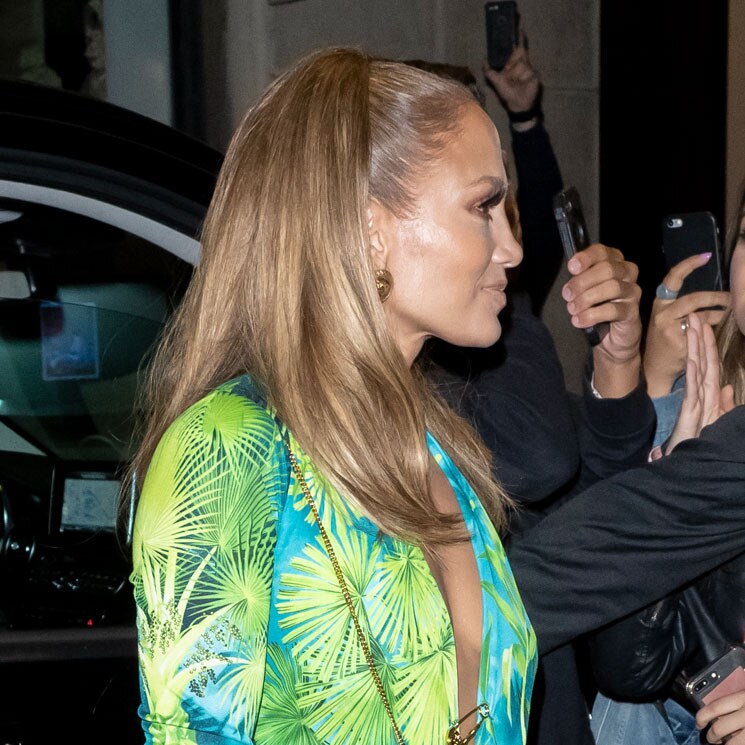 Jennifer Lopez takes a cue from herself in a Versace mini dress