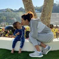 Eva Longoria shares her secret to Santiago's adorable pictures and her family's holiday plans