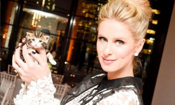 Pregnant Nicky Hilton stuns in Carolina Herrera in New York City