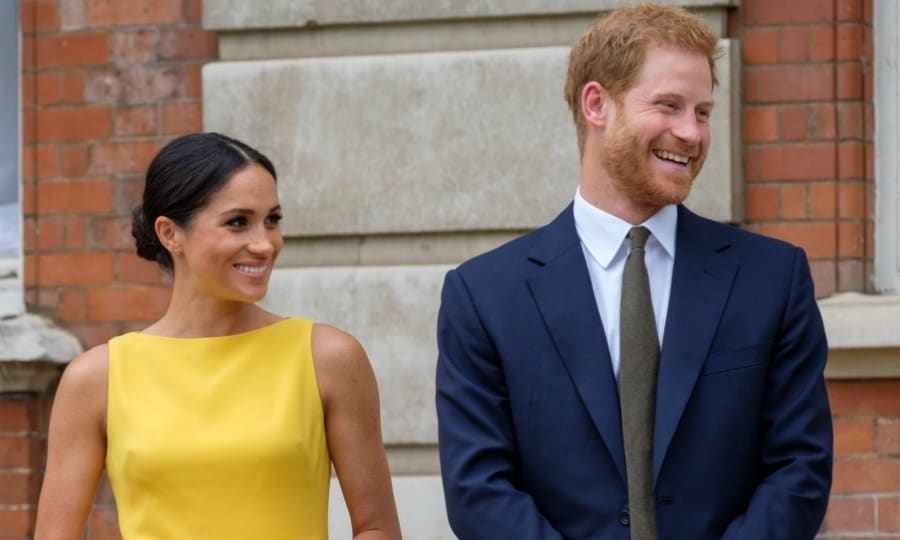 Meghan Markle steps out of comfort zone in bright dress for outing with Prince Harry