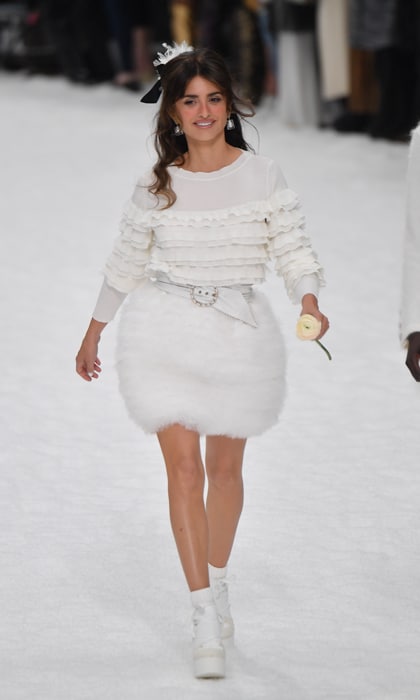 Penélope Cruz Braves the Paris Rain in All White for Chanel Show