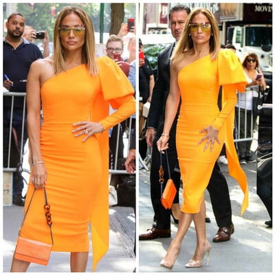 Jennifer Lopez with an orange dress by Alex Perry