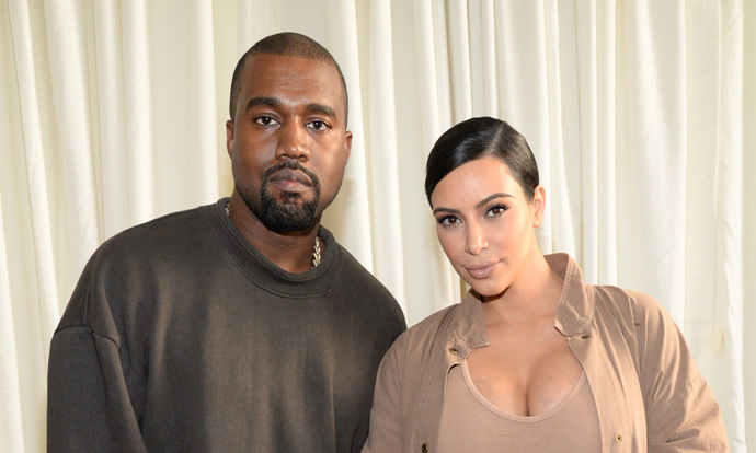 Kim Kardashian and Kanye West leave the hospital with newborn son Saint