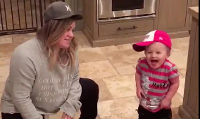 Kelly Clarkson jokes that this song is 'totally inappropriate' for her daughter, but they dance to it anyway