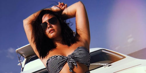 Demi Lovato gives a lesson in body positivity after writer posts about her 'fuller figure'