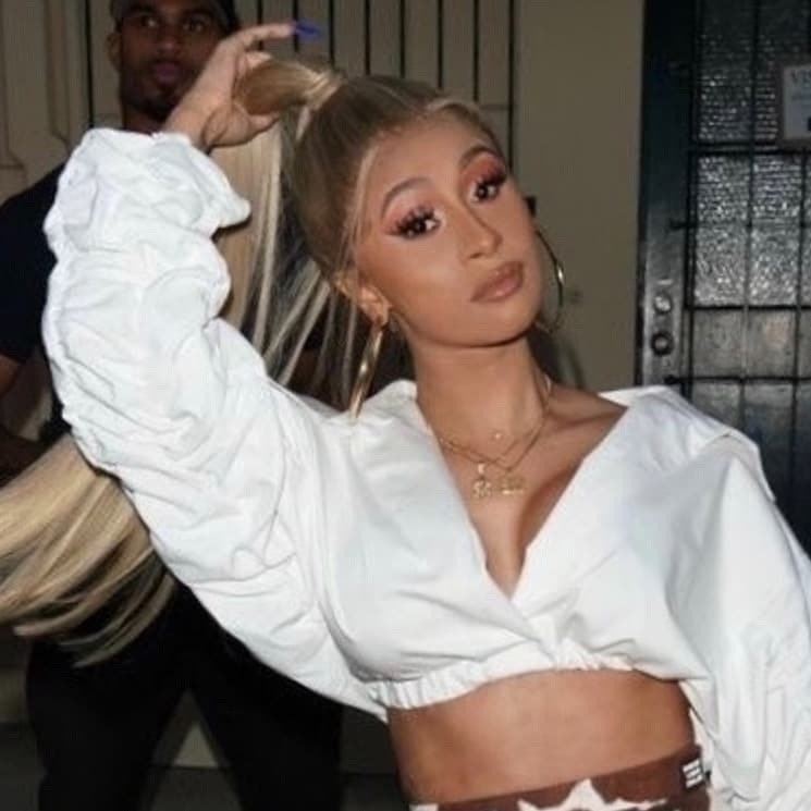 Cardi B channels Ariana Grande with a fierce, high ponytail