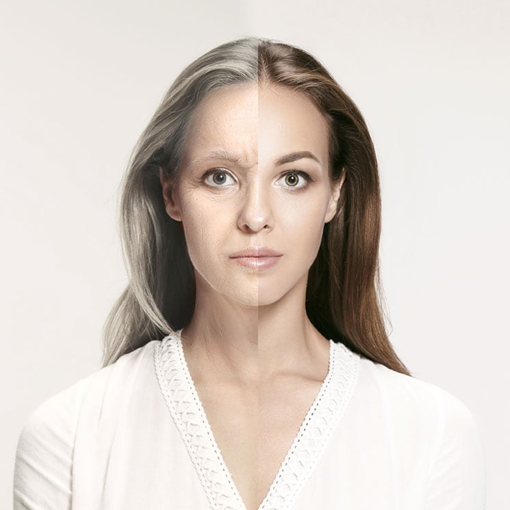 Divided face of a young-older woman