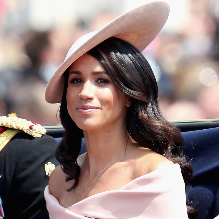 The Duchess wears Givenchy: Meghan Markle in talks with Vogue for column