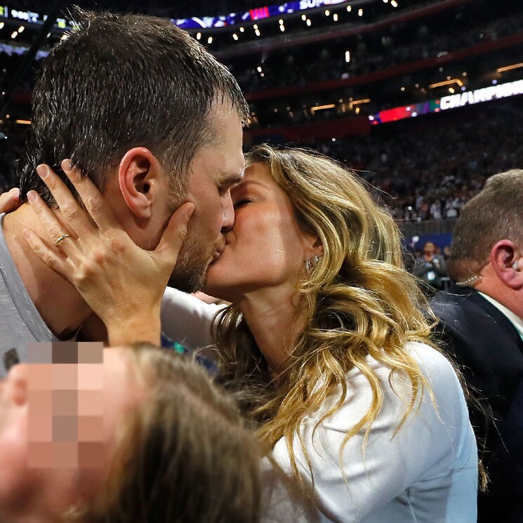 Gisele Bündchen plants kiss on Tom Brady as they celebrate Super Bowl win - see the sweet moment!
