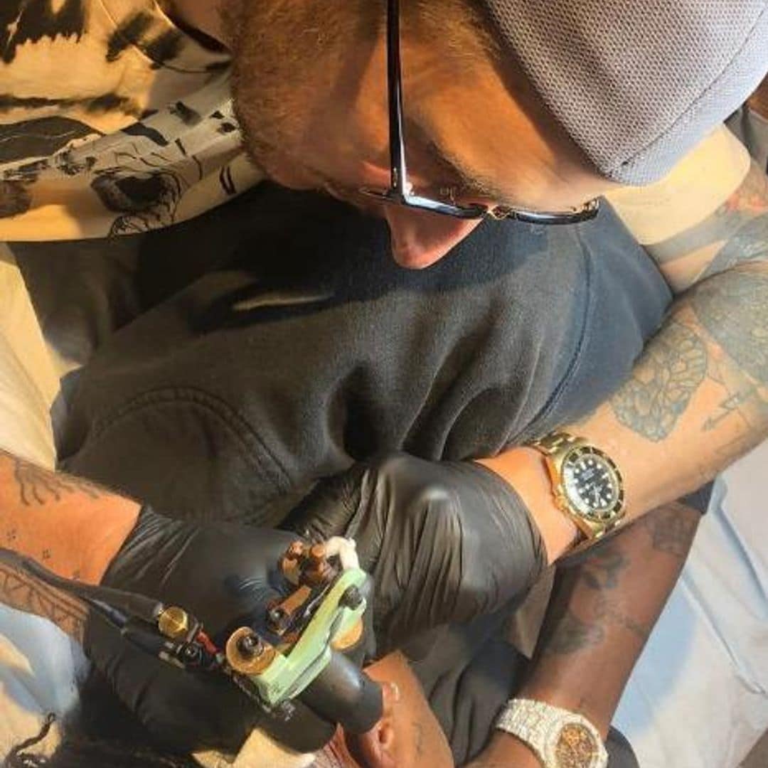 Travis Scott y sus tatuajes en la cabeza