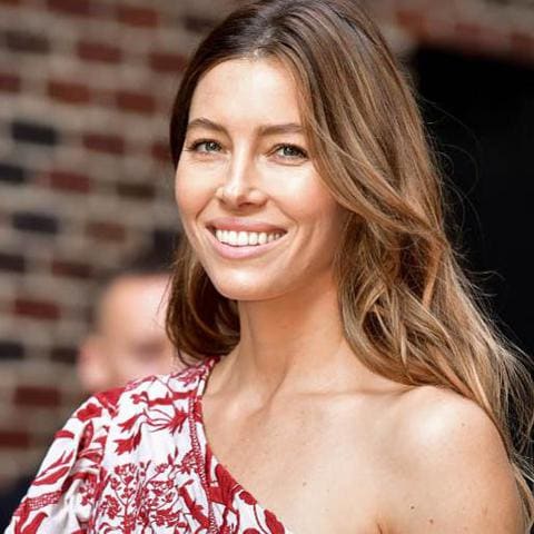 Jessica Biel shows her toned arms in a blue suit