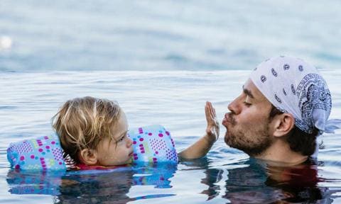 Enrique Iglesias and daughter Lucy in the water