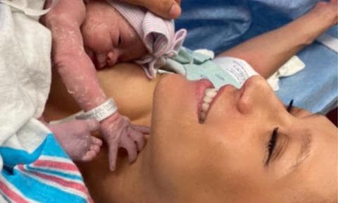 Anna Kournikova posing with new baby daughter