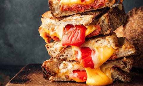 Toasted sandwiches with chorizo, cheese and grilled peppers