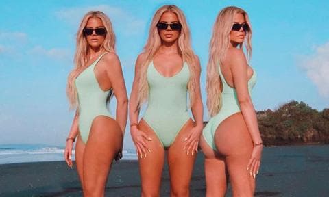Khloé Kardashian in a mint green bathing suit