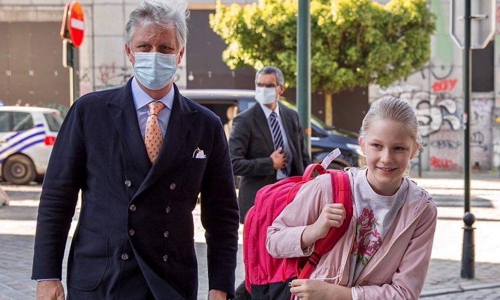Belgian King wears face mask as he takes daughter to school