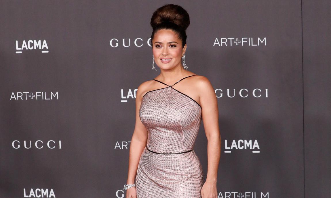Salma Hayek wearing a Gucci dress with pink sequins