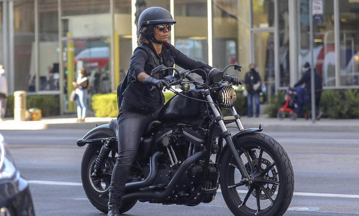 Halle Berry on a bike