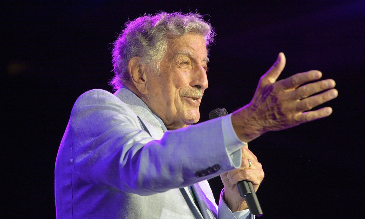 US singer Tony Bennett (Anthony Dominick Benedetto) performs onstage during an invitation-only concert at the newly opened Encore Boston Harbor Casino in Everett, Massachusetts.