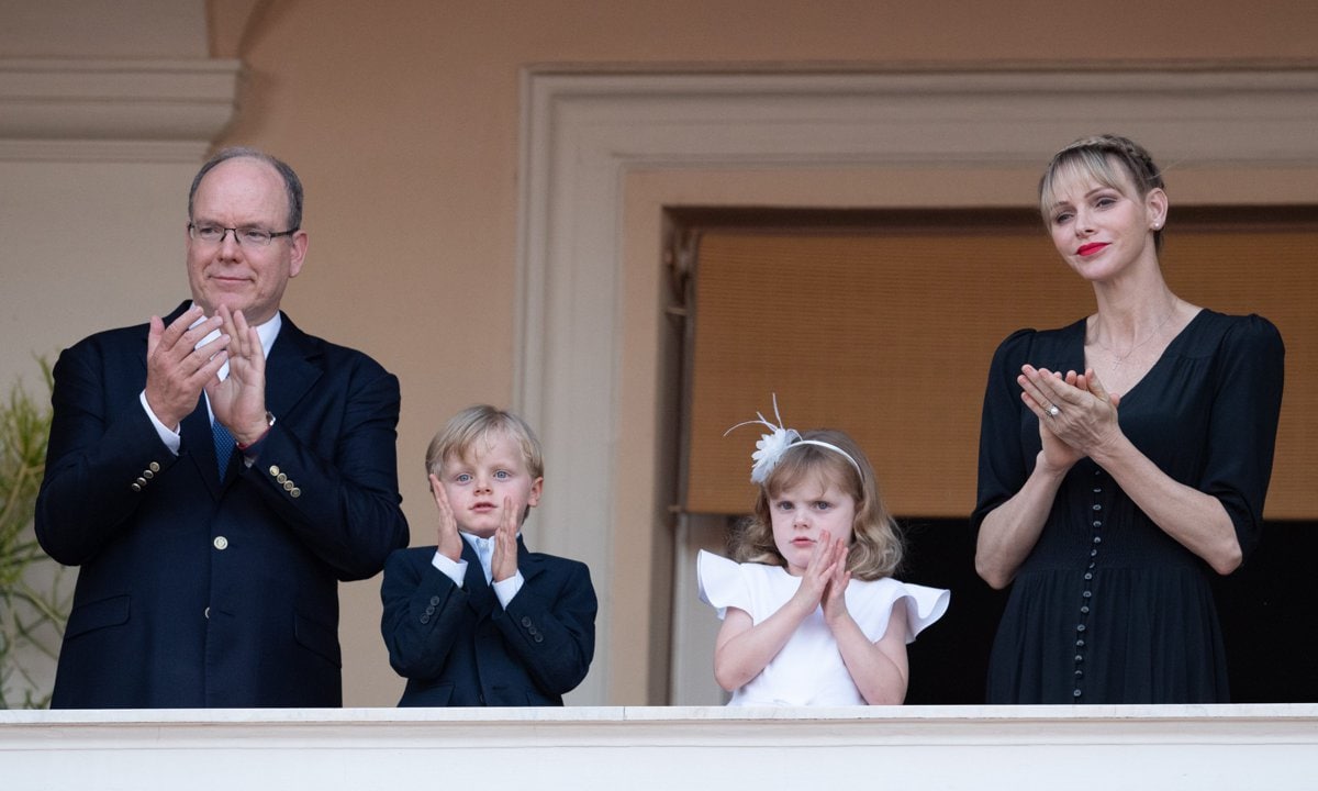 Princess Charlene and Prince Albert paint Easter eggs with their twins in new family photo