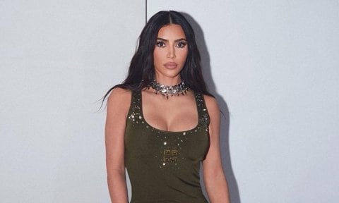 Kim Kardashian rocked a green Givenchy gown to celebrate Fashion Week