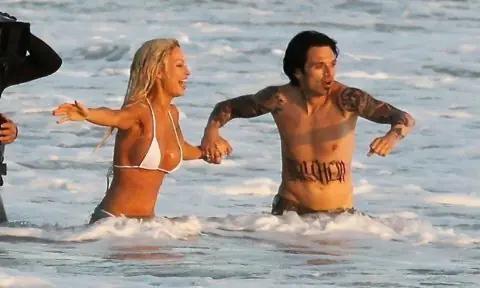 Lily James and Sebastian Stan Film Pamela Anderson and Tommy Lee's 1995 Beach Wedding for Hulu Show