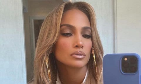 Jennifer Lopez rocks sky high gold boots for 'Fashion Friday'