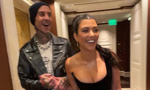 Travis Barker and Kourtney Kardashian run through a hotel in Las Vegas