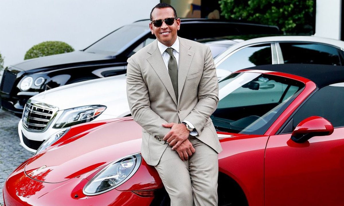 Alex Rodriguez poses with red Porsche he once gifted to Jennifer Lopez