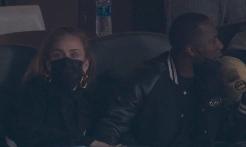 Adele and boyfriend Rich Paul hold hands at the Chargers game