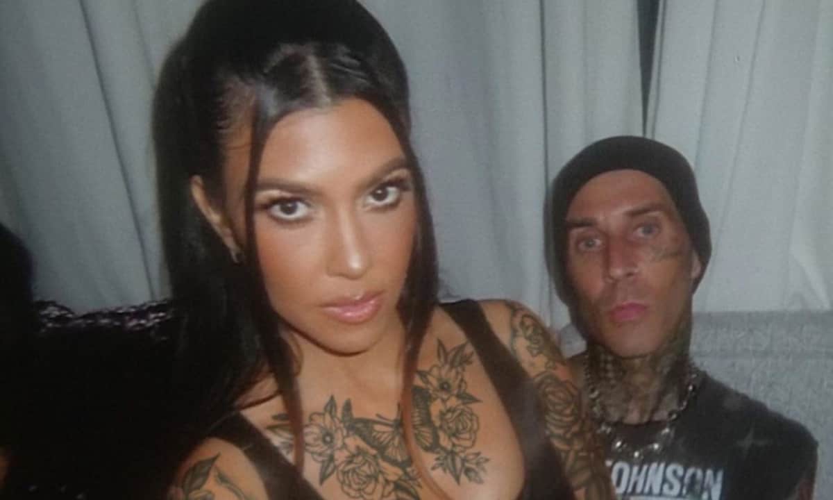 Travis Barker shares a snap of fiancée Kourtney Kardashian covered in tattoos