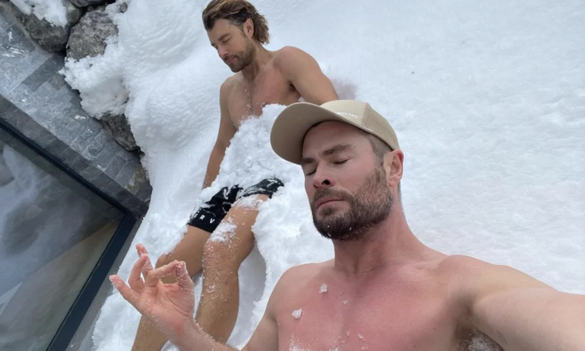 chris-hemsworth-ditches-ice-baths-for-a-shirtless-snow-bath-to-soothe-his-muscles.webp