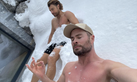 Chris Hemsworth ditches ice baths for a shirtless ‘snow bath’ to soothe his muscles