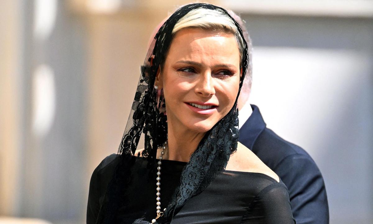 Princess Charlene wears black to meet with the Pope