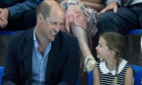 Prince William flies Princess Charlotte in a helicopter
