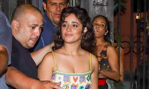 Camila Cabello guarded while leaving a bar in Rio de Janeiro