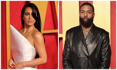 Kim Kardashian holds Odell Beckham Jr.’s face as he wraps his arms around her waist