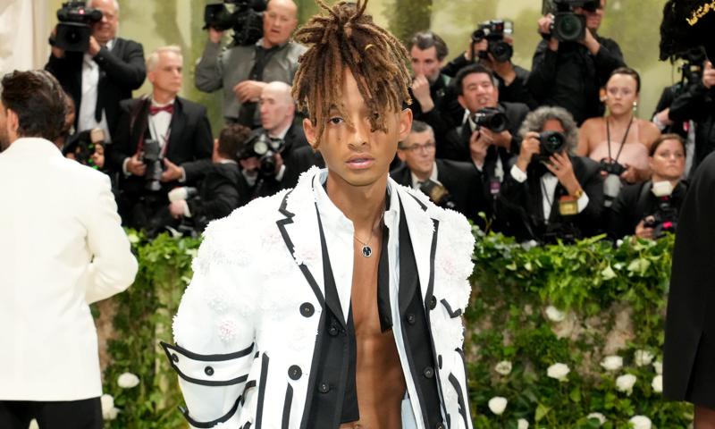 Jaden Smith falls off his skateboard after being pursued by paparazzi